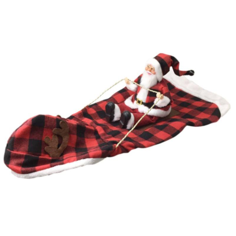 Medium-sized dog wearing a festive Santa Claus dog costume with easy buckle collar and red-and-white trim