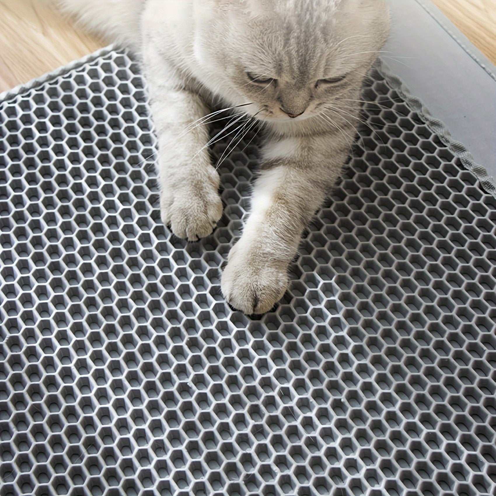 Extra-large Double-layer Litter Mat, Made of Splash-proof and Leak-proof EVA Material to Prevent Litter Scatter. Features Non-slip, Washable,, and Odor-resistant Properties for Easy Cleaning. Ideal for Litter Boxes, the Ultim